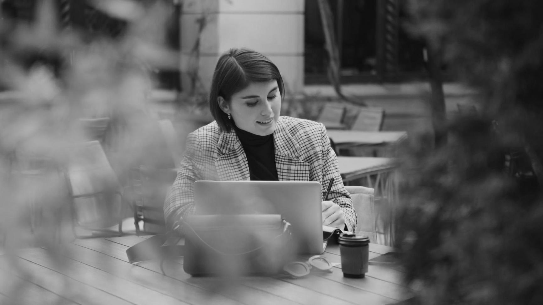 Students engaged in collaborative learning session focused on economic analysis and financial planning strategies