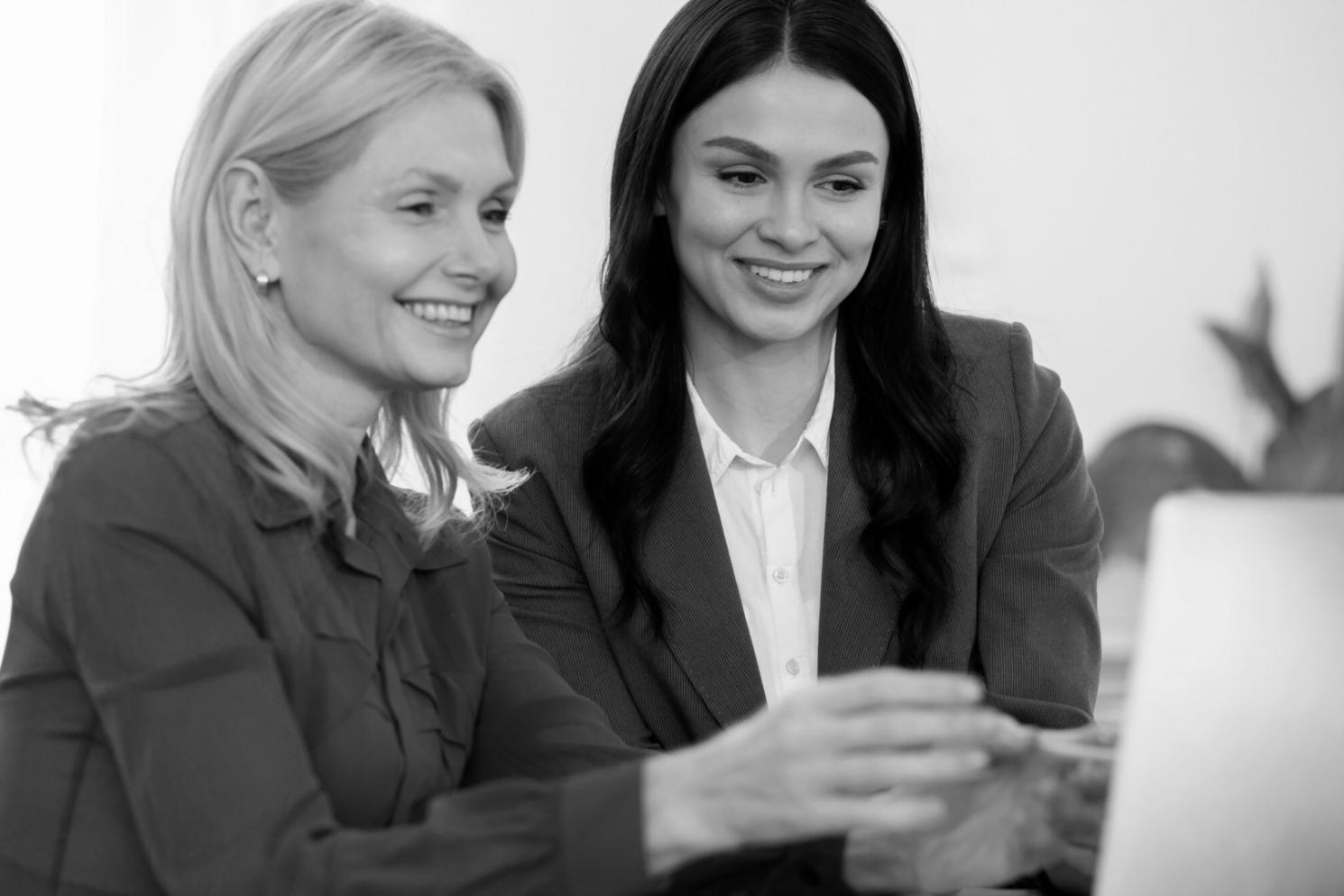 Business professionals analyzing financial charts and inflation impact data in a collaborative workspace environment